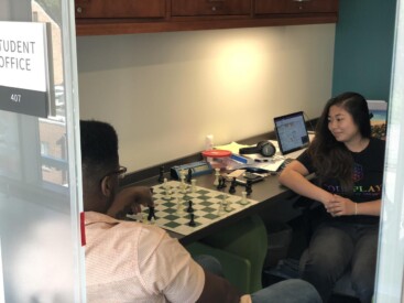 Sarah, a nationally ranked Chess player who moonlights as a biochemist, playing JJ...again.